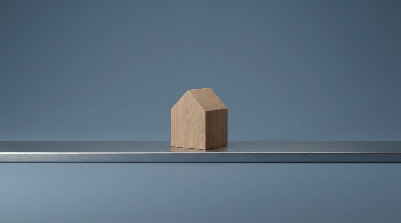 A small wooden house model sitting on a flat metallic trend line against a muted slate blue background